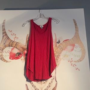 Red tank. Soft and fits loosely. No flaws